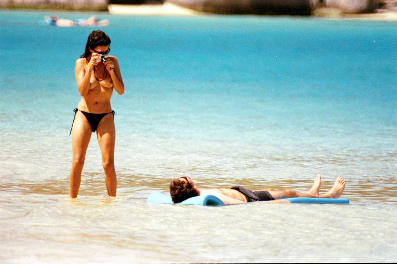 toplessbeachcelebs:  Penelope Cruz (Actress) swimming topless on the beach (February