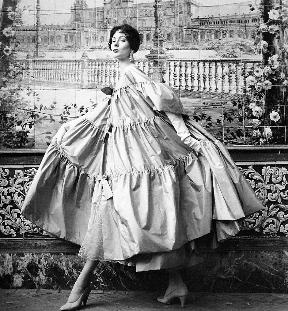 wehadfacesthen:  Suzy Parker in a taffeta evening coat by Manuel Pertegaz in a photo