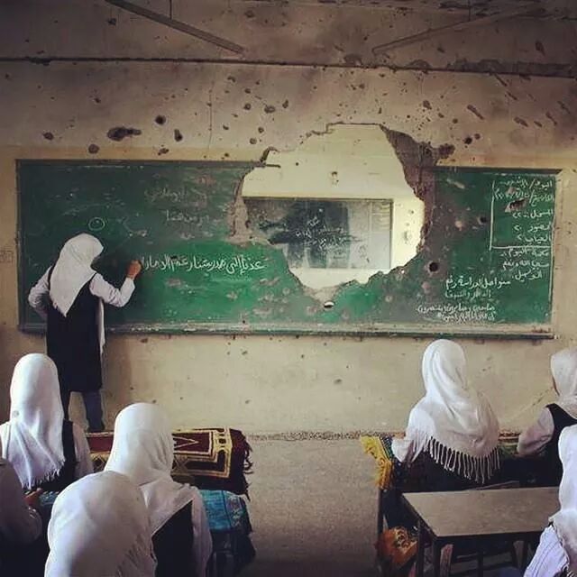 This is badass, too. Ginormous shell hole in the middle of your blackboard? Just teach around it, no big.