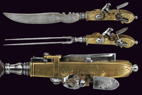 A very lovely set of 18th century German flintlock pistols/eating utensils.  Unscrewing the knife bl