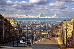 sixpenceee:  The Egyptian pyramids as seen from Cairo. 