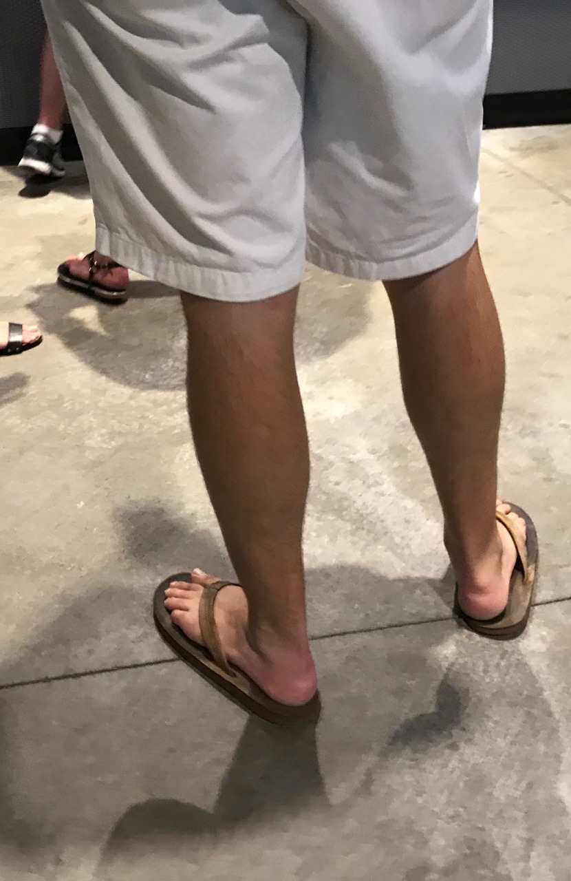 male feet in flip flops