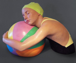 manacontemporary:  Carole A. FeuermanBrooke with Beachball2011Oil on resin, 19 x 27 x 20”Renowned hyper-realist sculptor, Carole A. Feuerman, creates from a fourth floor Mana Contemporary studio. 