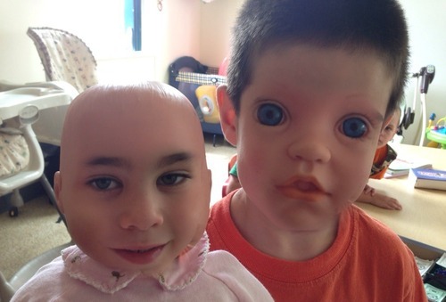 Switching children&rsquo;s face&rsquo;s with there dolls turns up horrible 