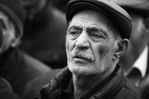 Faces of political demonstration Portraits made at one of the Armenian electional meetings of o