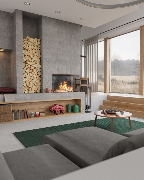 remodelproj: Sunken living room with built-in concrete fireplace / wood storage / seating area.