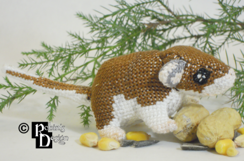 Squirt the deer mouse promises not to stir on Christmas eve. The pattern for this tiny 3D cross stit