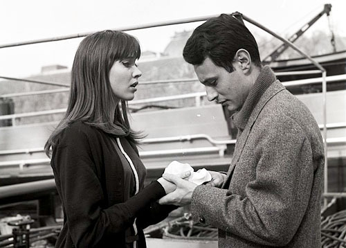 missgilda:Anna Karina and Michel Subor on the set of Le Petit Soldat. Photographed by Angelo Fronton