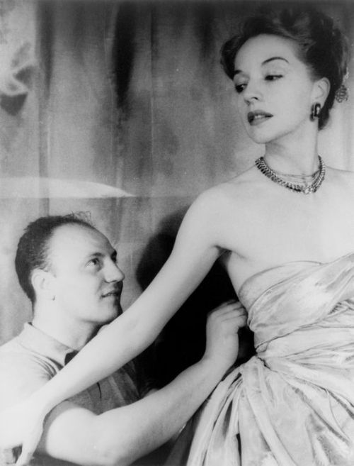 Pierre Balmain adjusting a dress on model Ruth Ford in 1947 (photographed by Carl Van Vechten)