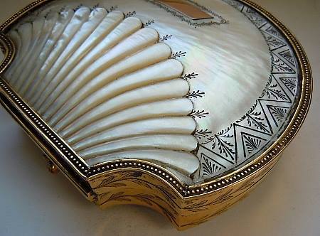 ganymedesrocks:arsenicinshell:Rare and beautiful sewing kit. The carved shell lid mounted cabinet an