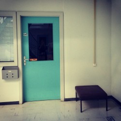 lonelychairsatcern:  #lonelychairsatcern turquoise door and ottoman (?) in #b104 #CERN