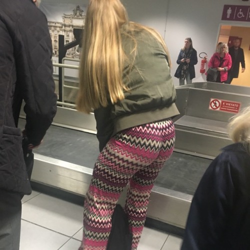 Found this nice girl showing her cute butt at the airport in Rome, Italy. Made waiting for my bag wo