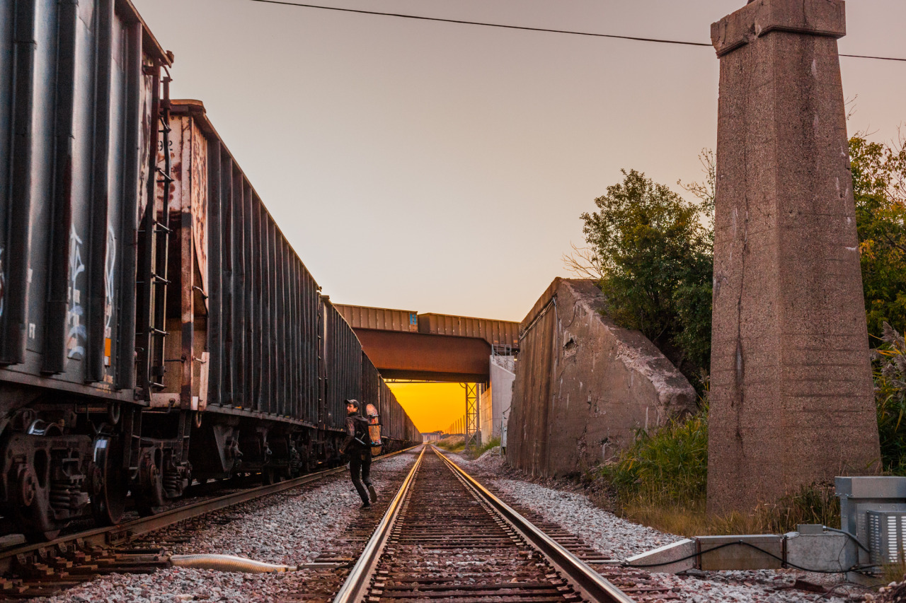 gregwasout:  Shea hopping on a freight train. Chicago, Illinois. September 2013.