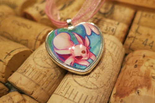 Super Cute Eeveeloution Necklaces!  From the Shop owner herself at CharmingSushi The interior design