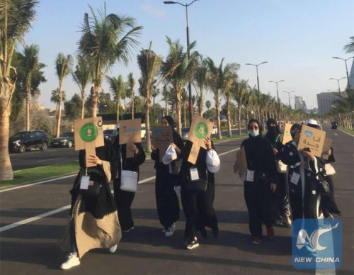 Saudi women go on a walking parade on March 8, 2018 in the coastal city of Jeddah on the occasion of