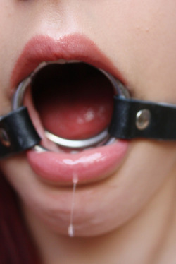 mastermbf:  Presentation. Training. Beautiful drooling is a nice extra of ring gag usage.  Lips