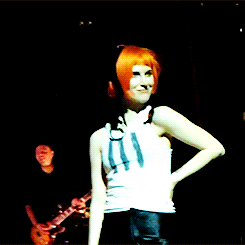 istillloveparamore:  omgparamoregifs-blog: Hayley and a bra thrown on stage x  slay!