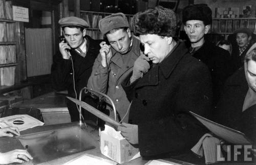 Russians listening to records(Edward Clark. 1955)