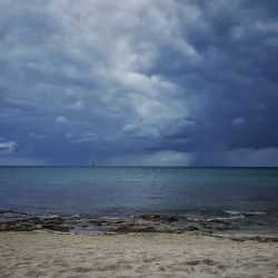 There are storms-a-brewin down here in Cozumel