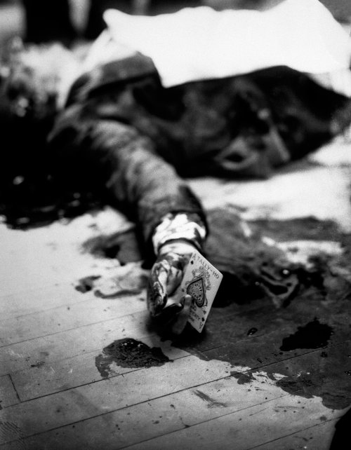 Bullet riddled corpse of infamous mafia boss Joe Masseria, 1931. The ace of spades most likely was s