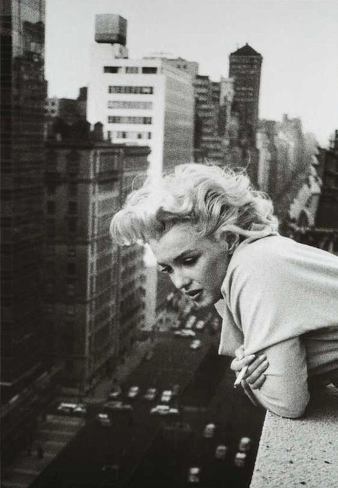 Marilyn Monroe on Instagram: “Marilyn Monroe perfuming herself with Chanel N °5 at the Ambassador Hotel in New York, Ma…
