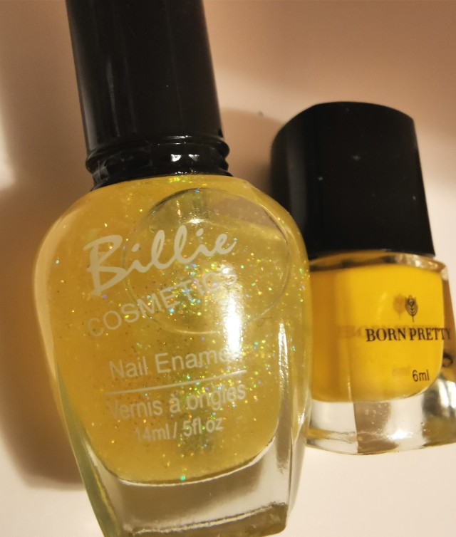 2 bottles of nail polish used on the Middle Finger: Born Pretty Stamping Nail Polish egg yolk yellow shade identified as "6#" topped with Billie Cosmetics "Elated" 