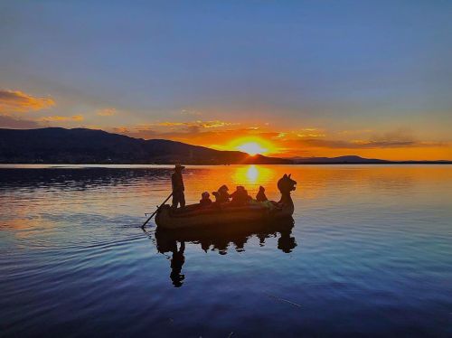 #travel #diary  #real #beautiful #sunset  #lake #titikaka  #blue #orange #boat  www.instagra