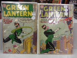 zerocub:  Found these at work. Apparently silver age Green Lantern spent a lot of time flying above the city and getting punched in the face. Lol
