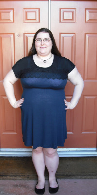 thegoodhausfrau:  My Christmas dress. I made people stare at my fat and very pale legs in a dress that was stretched to the point of being opague in bright light. Fat fat fat fat. Too bad the food was meh. How am I supposed to gain weight with meh food