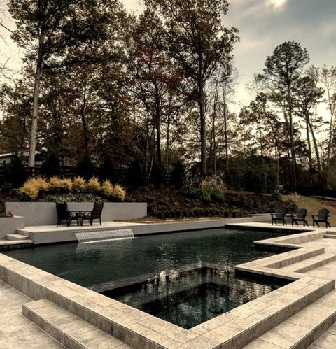 Atlanta Landscape Natural Stone PaversAn Example Of A Mid-sized Contemporary Full Sun Backyard Stone