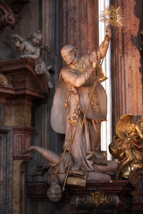 signorcasaubon:  Saint Ignatius of Loyoloa Defeating Heresy; a statue in the Church of Saint Nicholas, Mala Strana, Prague.