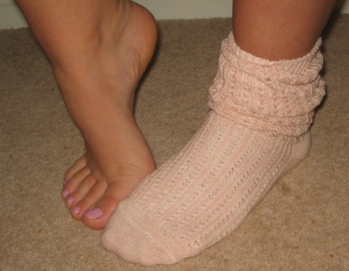 footslutnicole:  I love these socks, they’re so warm and cute, just perfect for a quiet night at hom