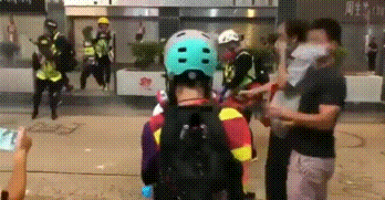 kropotkindersurprise:October 27 2019 - A protester in Hong Kong uses a lead blower to keep tear gas 