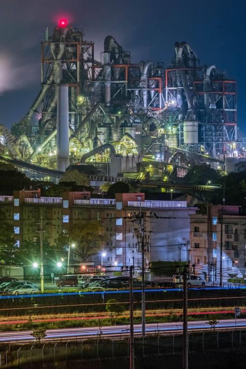 evilbuildingsblog:Mitsubishi Cement Plant in Kyushu , JapanThis can’t be an unaltered photo, can it?