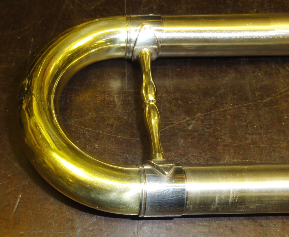 synthesis-music:  Dent in a tuba tuning slide (along with a crushed bell, broken