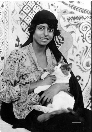 bastet-rising:   Egyptian woman and her cat, 1923.