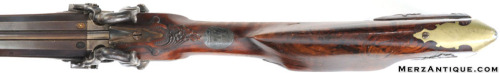 A percussion muzzleloading .58 caliber rifle/20 gauge shotgun combo, German, 19th century.For sale b