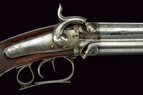 A four barreled percussion shotgun originating from France, mid 19th century.