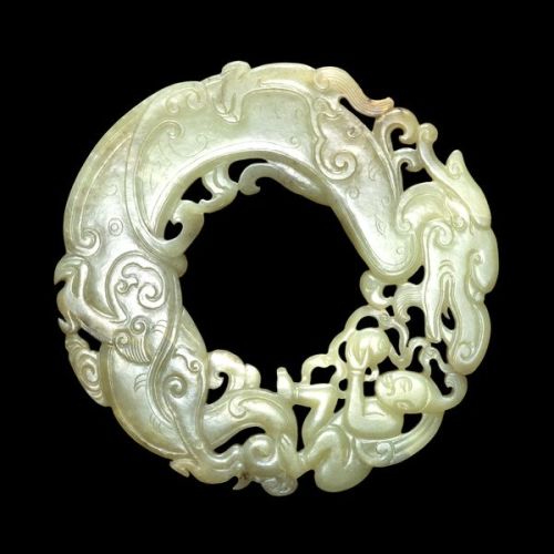 Archaistic jade ring / pendant. Ming dynasty, 15th-16th century AD, China. In the shape of a dragon 