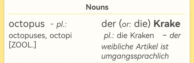 A screenshot of an online dictionary. At the top it says Noun, below that is one row of a table with two columns. The left column says: octopus - pl.: octopuses, octopi [Zool.]. The right column says in German: der (or: die) Krake - pl.: die Kraken - der weibliche Artikel ist umgangssprachlich