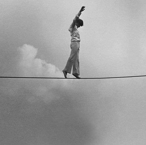 equatorjournal:  High Wire Artist Philippe Petit, 1974. Photo by Thierry Orbach.  “Since well before his epic 1974 walk between the Twin Towers of the World Trade Center, Philippe Petit had become an artist who answered first and foremost to the demands