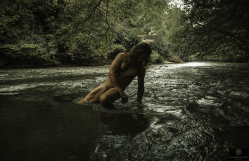 In the Etowah River in north Georgia on a hot summers day with Dojo. Copyright Light Turns to Life P