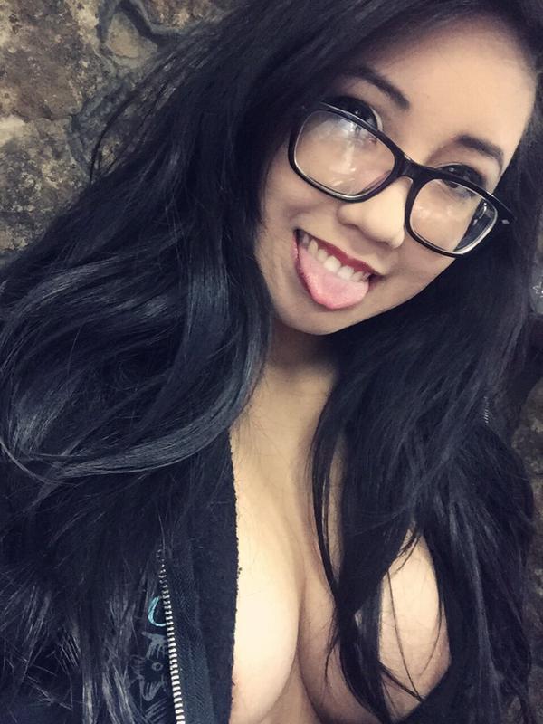 Hot Asian girl tits and glasses.