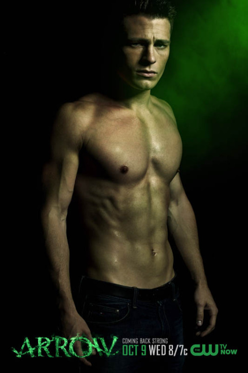 One of the most popular images in “Arrow” season one was series star Stephen Amell showing off his abs with his shirt off. In the same vein, the CW has released a series of four posters that not only show Amell shirtless, but also co-stars