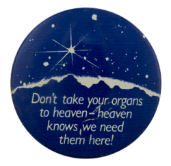 a blue pin with the silhouette of a mountain against the night sky with white text that reads'Don't take your organs to heaven - heaven knows, we need them here!'