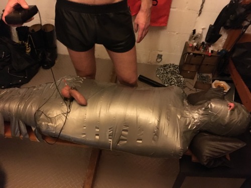 jamesbondagesx:  Intruder mummified and punished.