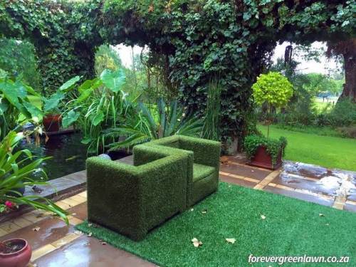 Garden furniture that we covered with artificial grass.