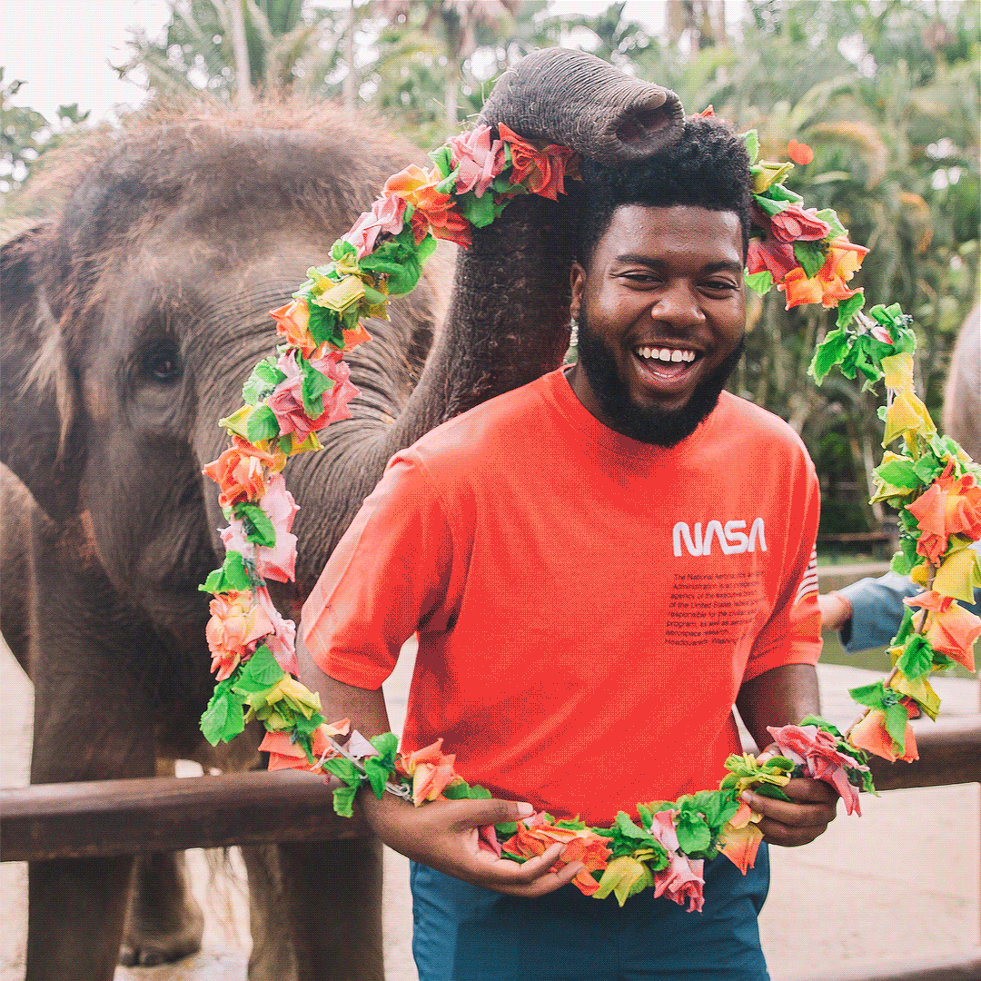 i rly can’t decide who’s cuter: khalid or this baby elephant 🐘🌸