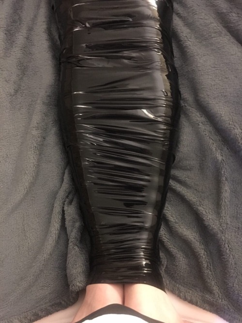 pup-demmy:  First experience with mummification. I had a super fun time! Awrooorooooo! Also first time in my new black style hood! Agh! Need more rubber! <3 awruff! Thank you massy for the fun time! <3