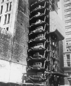 leasingauthority:  Have a great evening! Could you imaging leaving work and having to get your car out of this parking machine? [Car Parking Machine 1932 Chicago] 